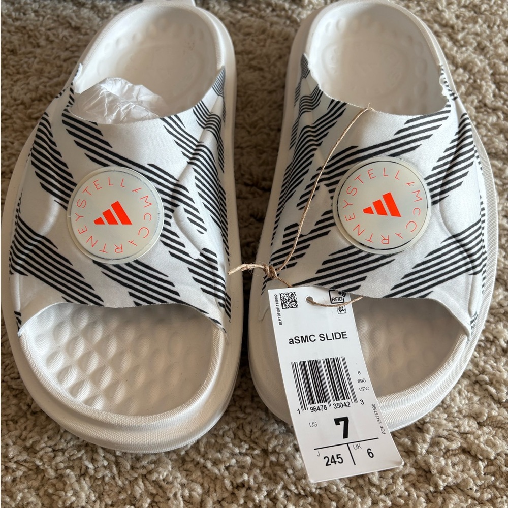 NWT- Stella McCartney Adidas)Slides -Black, White, and Florescent accent, 7(BIG)